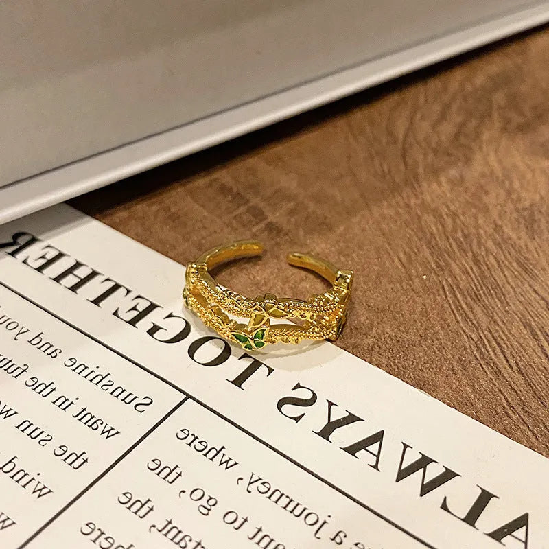 Creative Chinese butterfly women's copper ring with dripping oil treatment process in simple style.