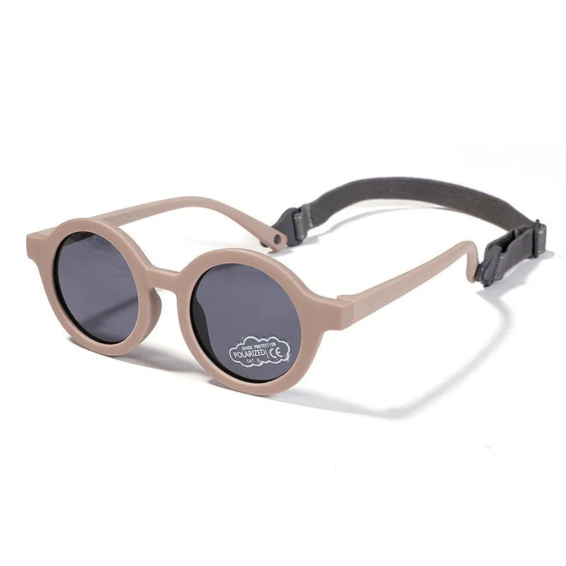 Children's silicone sunglasses with round frame and polarised lenses in multiple colours for 0-3 year olds