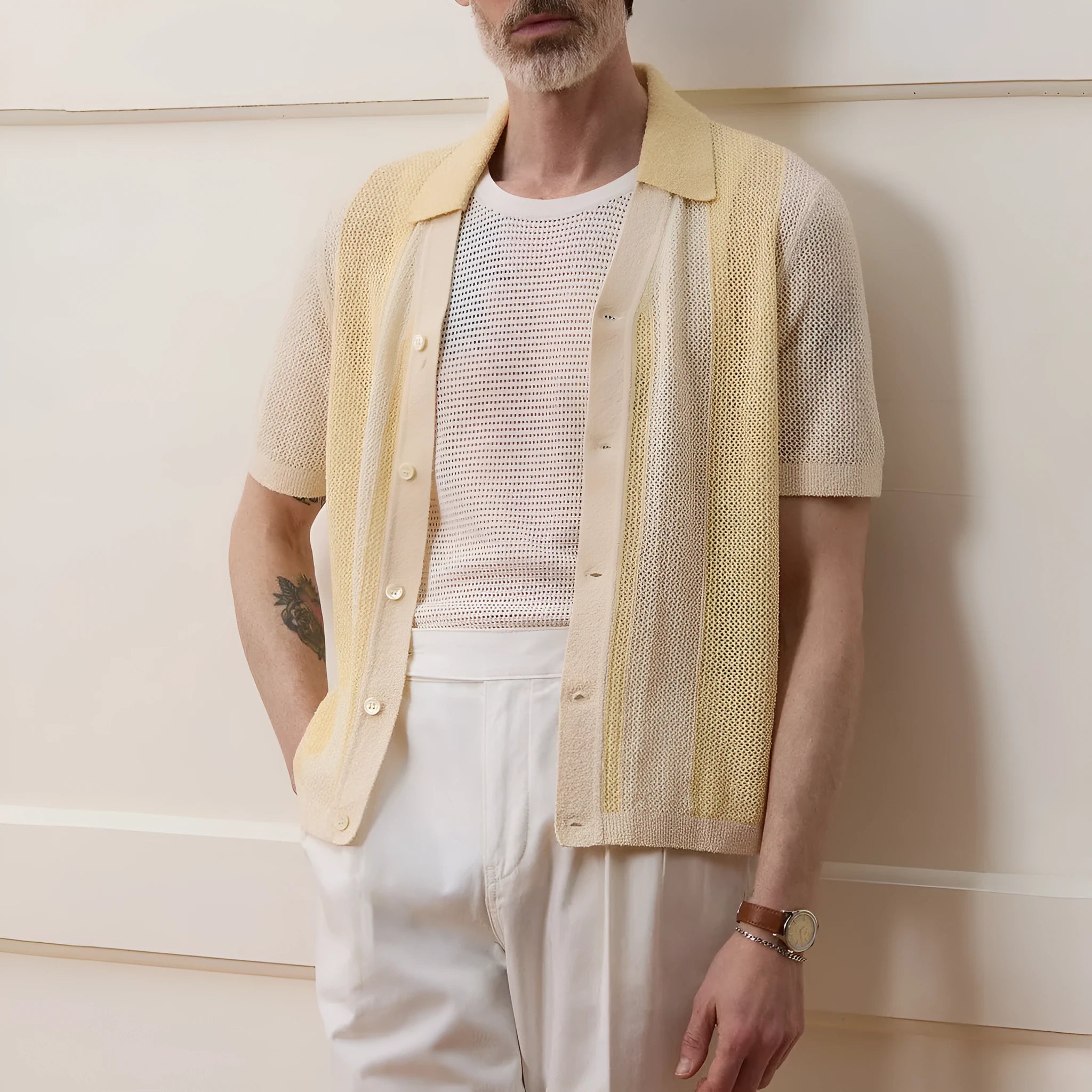 Yellow men's polo shirt with asymmetric design and short sleeves made from Tencel fabric