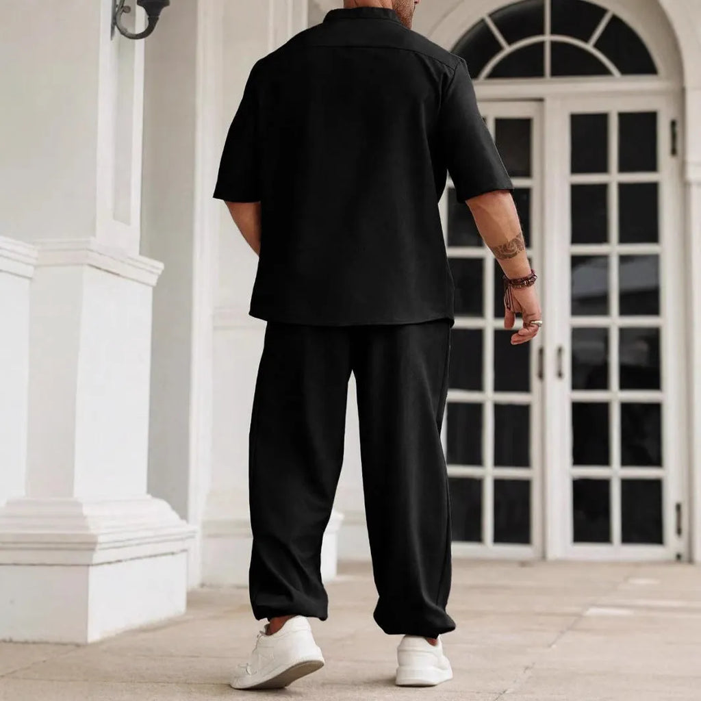 Men's casual apricot-coloured cotton linen short-sleeve shirt and trouser set laid flat.