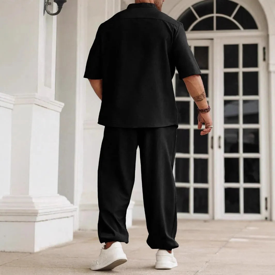 Men's casual apricot-coloured cotton linen short-sleeve shirt and trouser set laid flat.