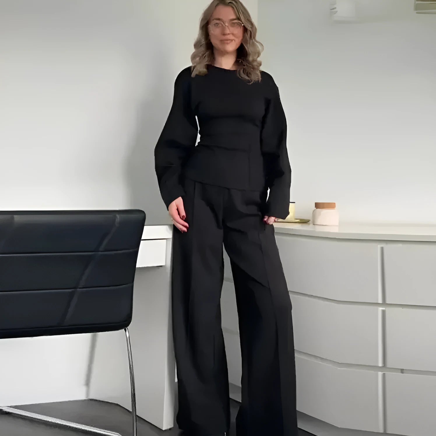 Women's black polar fleece suit set with O-neck top and wide leg trousers