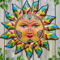 Iron sun face decorative metal wall hanging in a choice of colours for indoor or garden use.