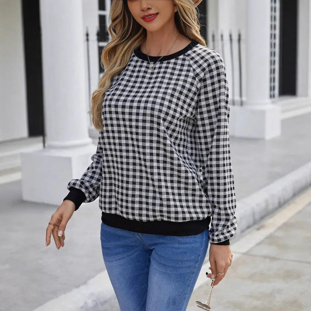 Black Japanese style plaid pullover sweater with long sleeves and printed pattern