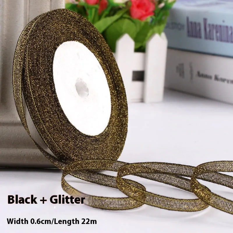 Roll of narrow 0.6cm wide polyester satin ribbon in a choice of colours, showing 22 metre length.