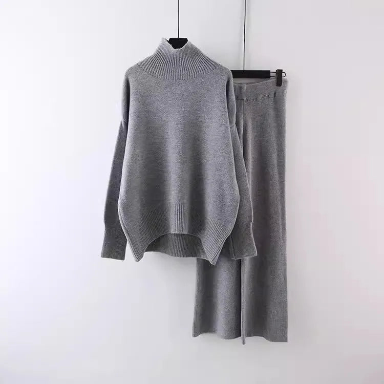 Women's casual acrylic fibre two-piece set with long-sleeve sweater and wide-leg trousers in solid colour.