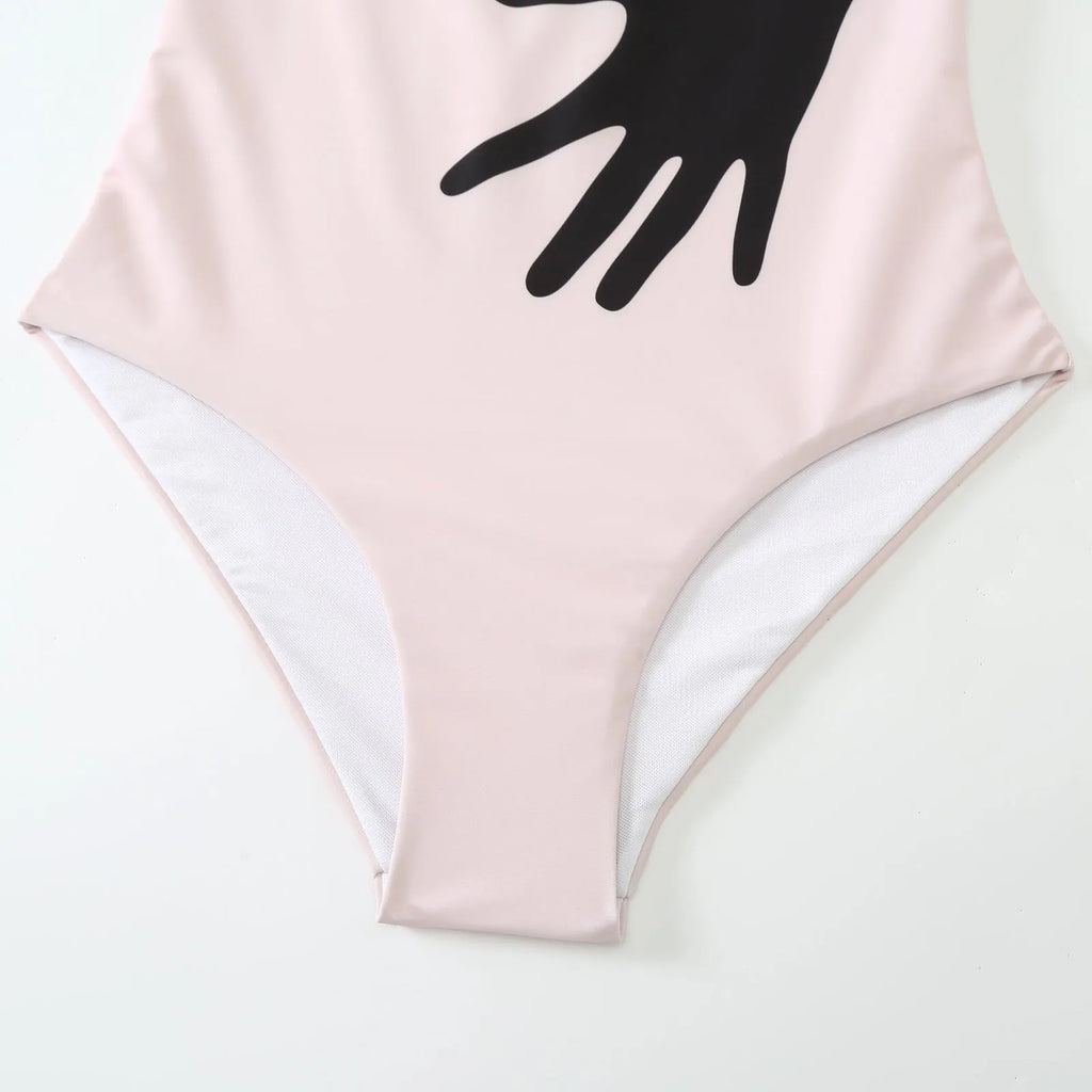 Patterned women's two-piece bikini swimsuit with a light tulle skirt.