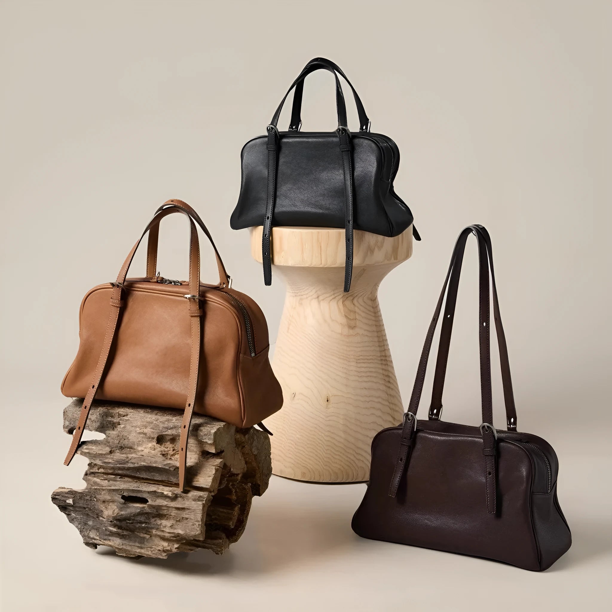 Women's black genuine leather retro shoulder bag showing horizontal square shape and double shoulder straps