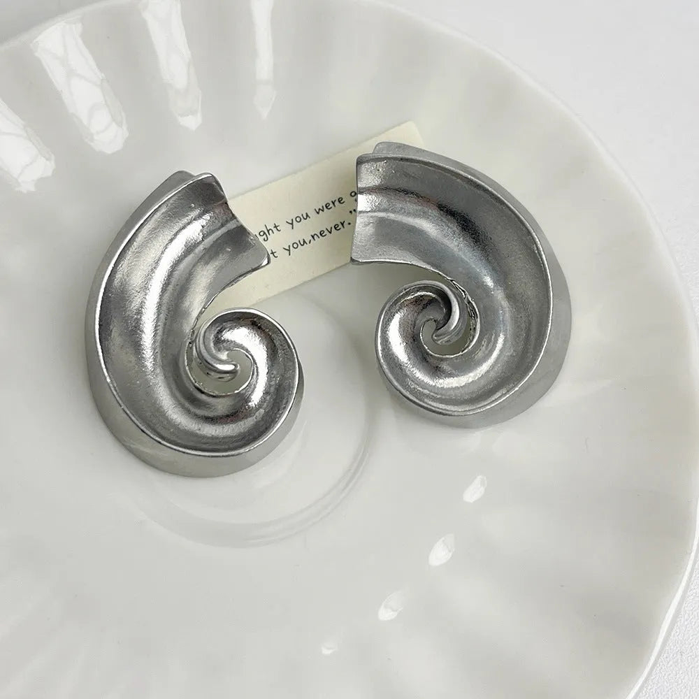 Geometric retro ear studs in gold and silver electroplated alloy, approximately 5cm size with stud fastening