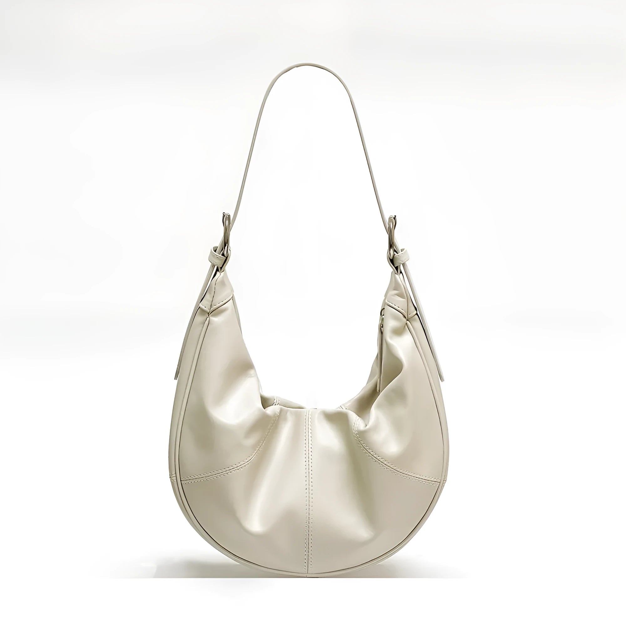 Women's soft cowhide leather dumpling-shaped shoulder bag in black with double straps and sandwich pockets.