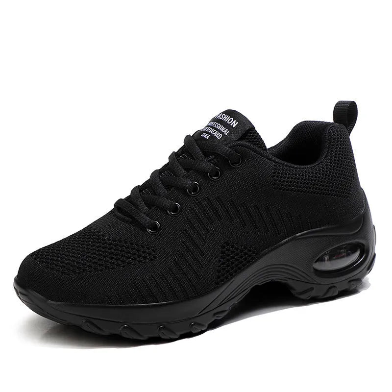 Women's red mesh sneakers with front lace-up design, round toe, and flat mid heel