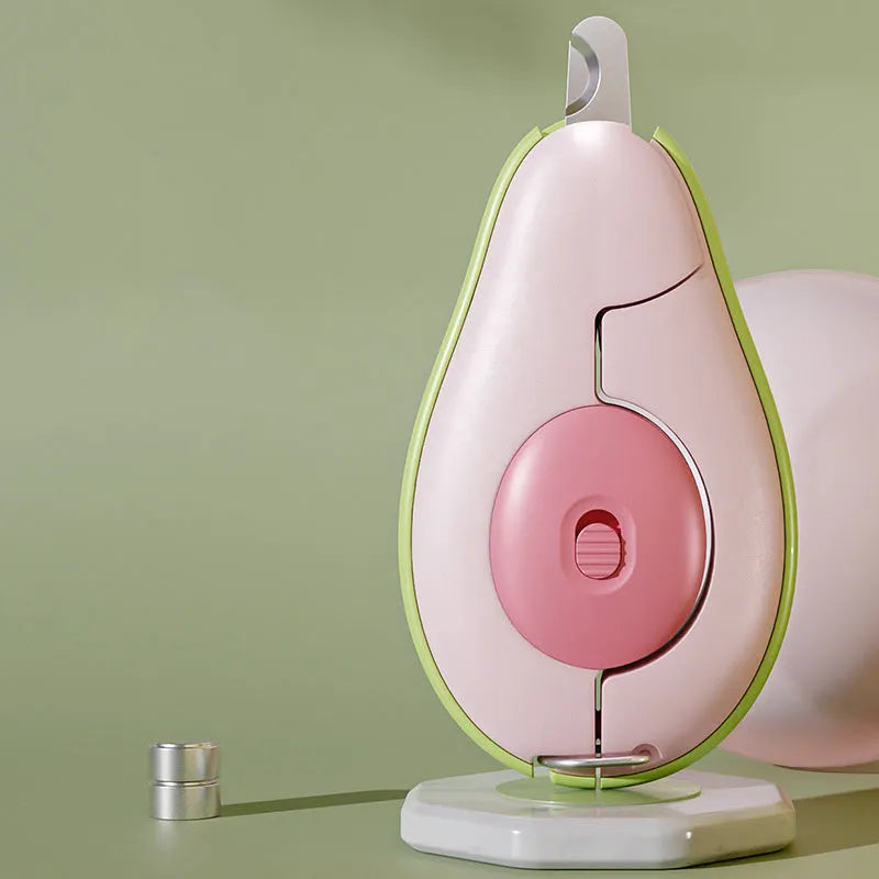 Green pet nail clipper with LED light on, showing scissor design and anti-slip handle for small dogs and cats.