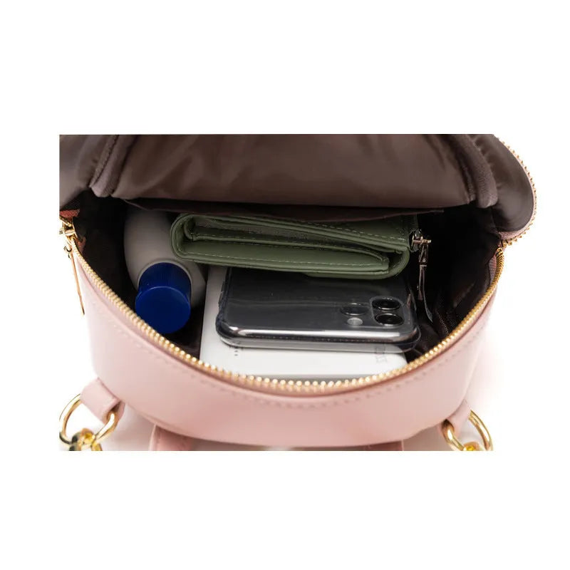 Soft PU mini backpack with large capacity showing three-dimensional pocket and street trend styling