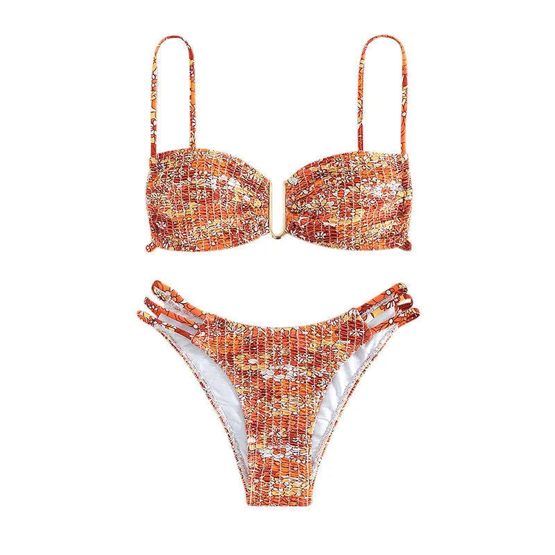 Women's high-waist floral bikini swimsuit on a hanger in blue, orange, pink, and rose red colours.