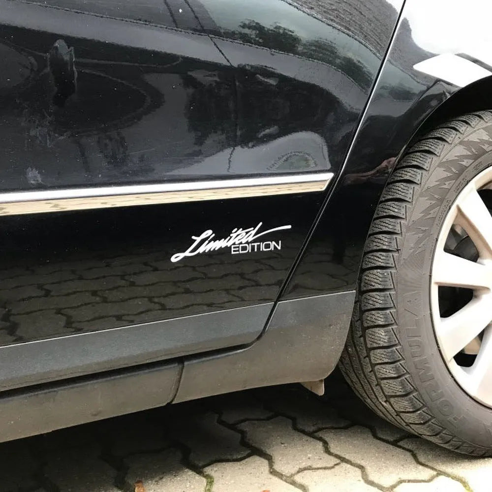 Reflective British bumper sticker on car, showing Black, White and Colourful options.