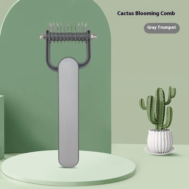 Dog grooming comb with stainless steel teeth and plastic handle in green or grey colour