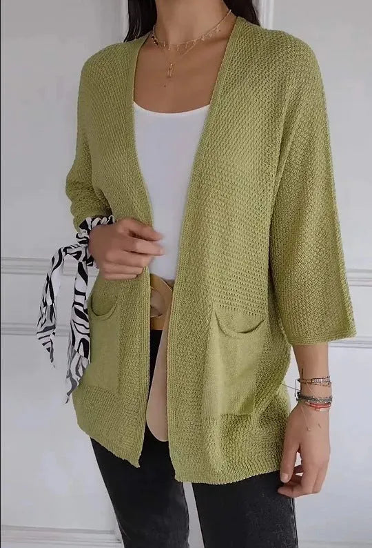 Women's waffle texture cardigan coat in army green with nine-quarter sleeves and pockets.