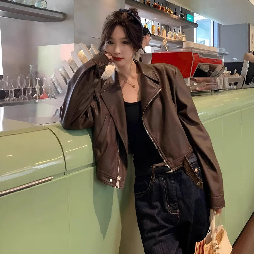 Women's retro slim fit imitation leather jacket in black with pocket detail, 40cm length