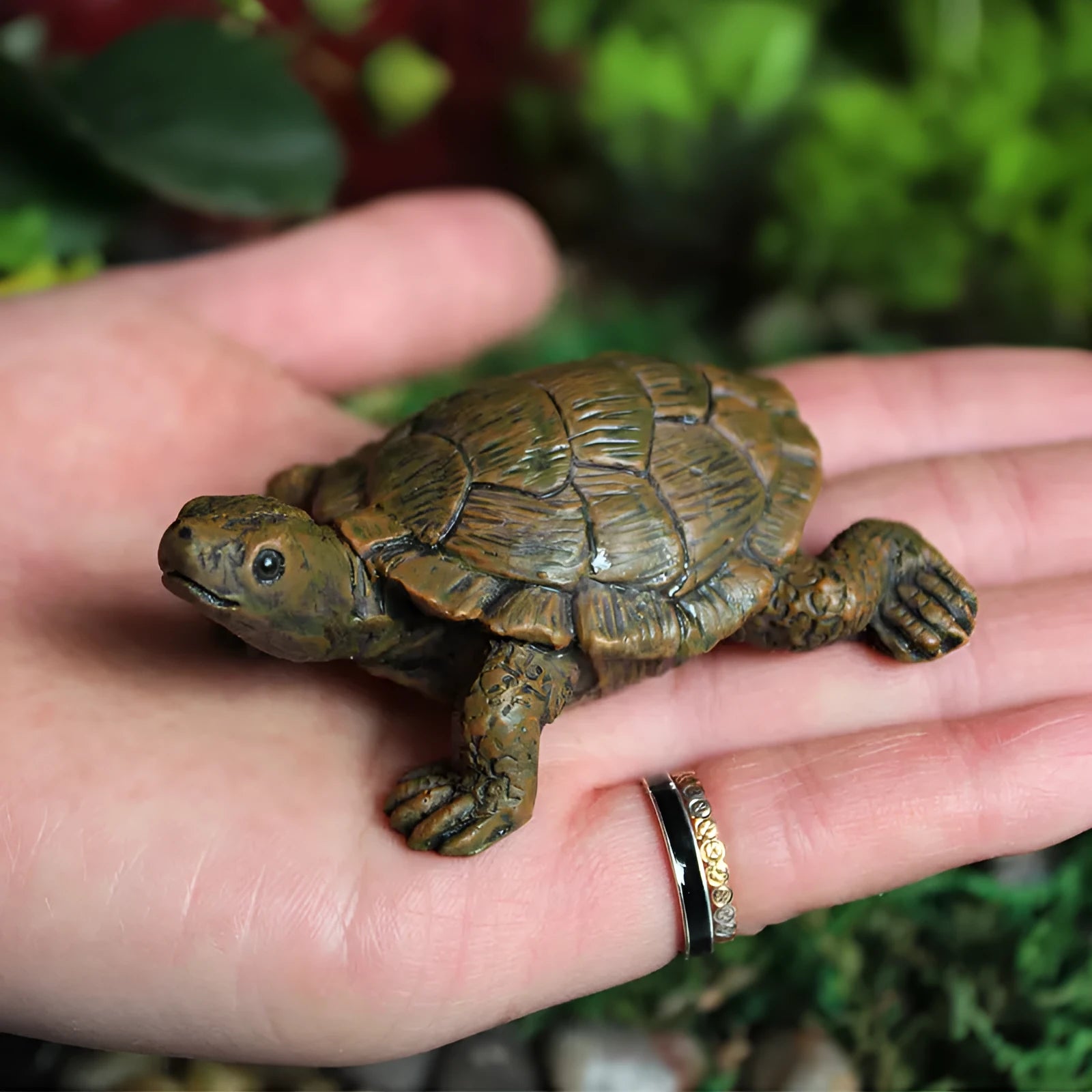 Realistic simulated turtle resin ornament for garden and terrarium decoration.