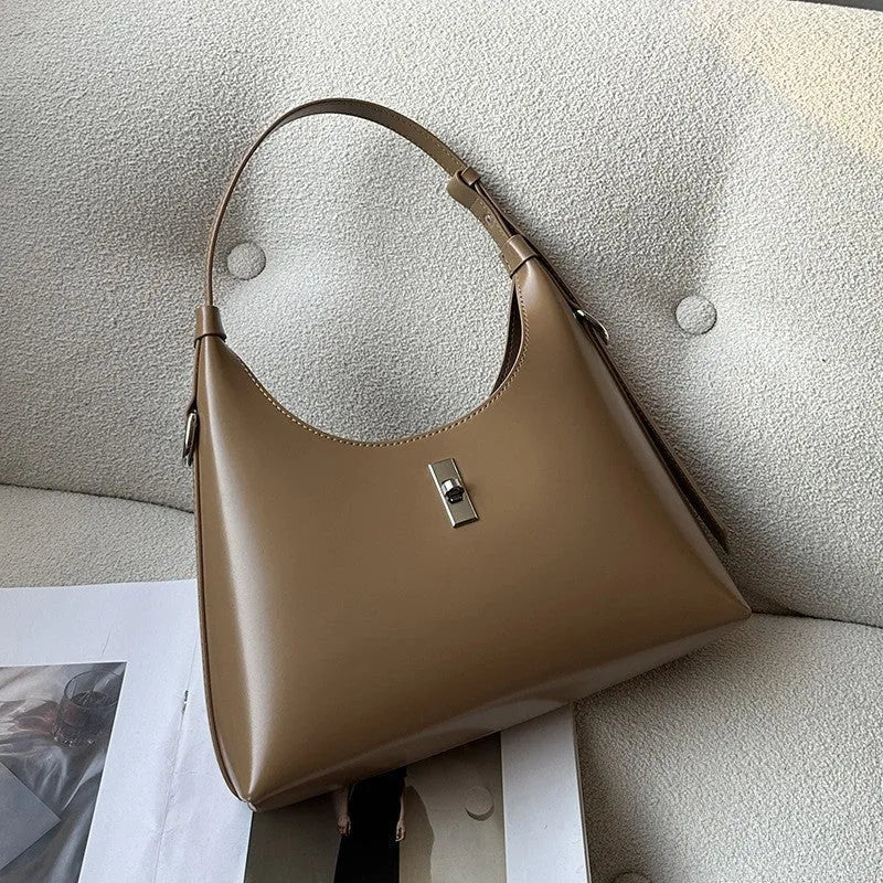 Genuine leather dumpling-shaped crossbody bag with multiple compartments in apricot colour