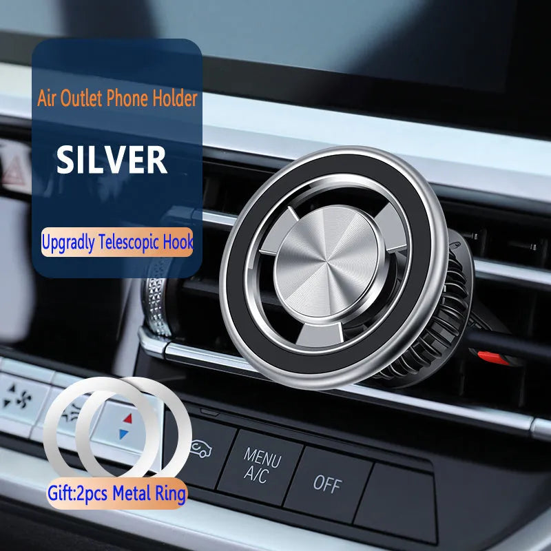 Silver magnetic air vent phone holder with snap-on bracket mounted on car dashboard