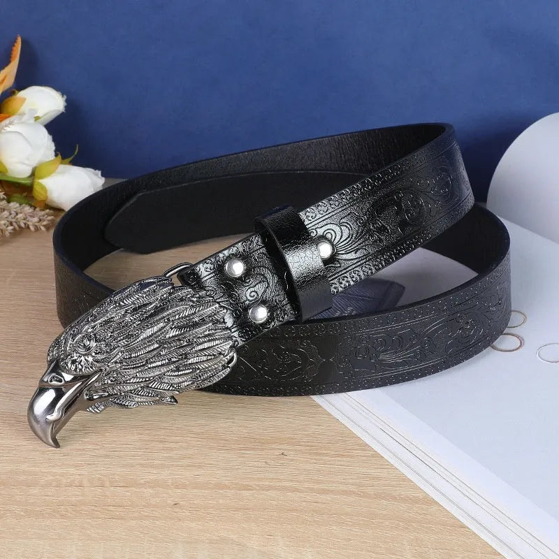 Men's black imitation leather belt with a detailed metal cow head buckle and pin clasp.