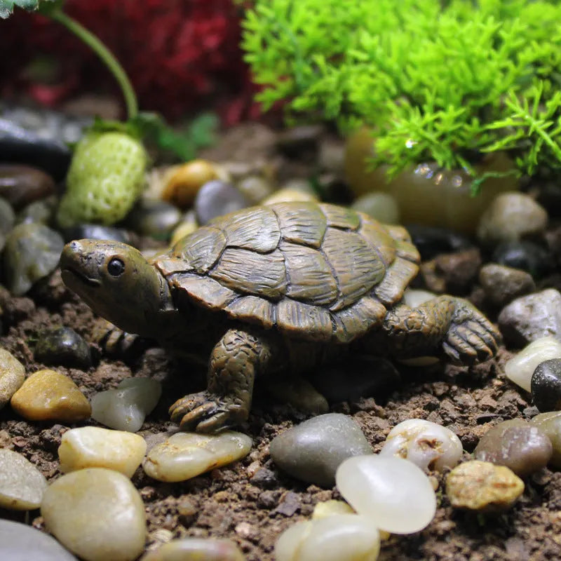Realistic simulated turtle resin ornament for garden and terrarium decoration.