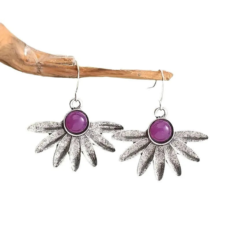 Purple resin gemstone bohemian earrings with floral design and animal zodiac elements on alloy metal