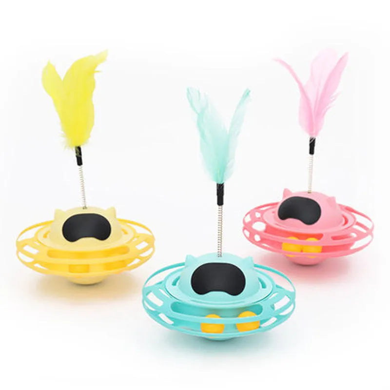 Pink cat tumbler turntable toy measuring 17cm tall with four play options