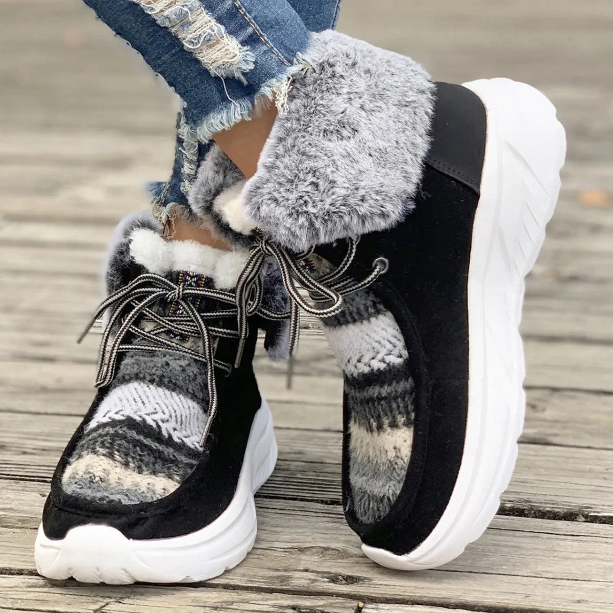 Women's lace-up snow boots with suede upper, plush lining, and platform sole