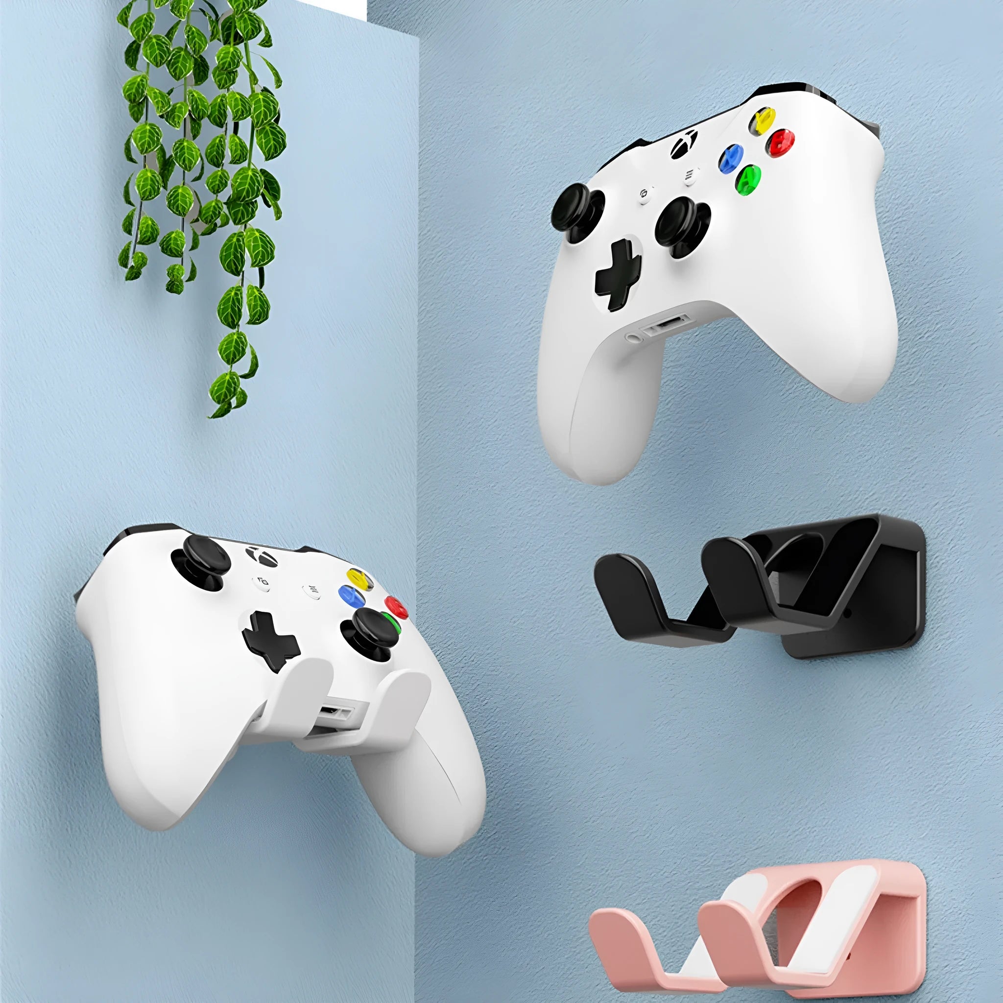 Universal non-perforated wall hanging rack for gaming controllers and headsets in black, white or pink colours