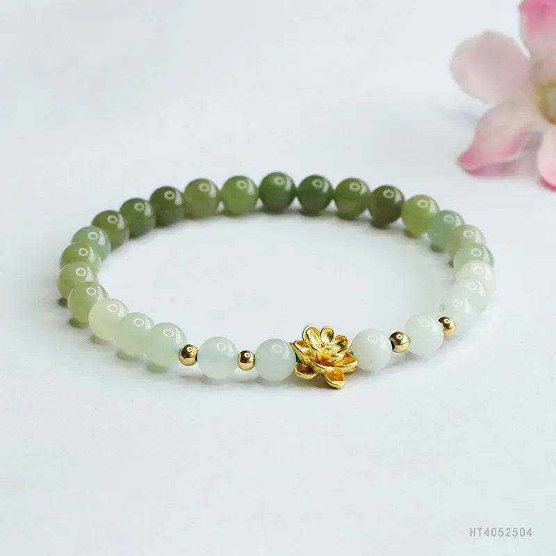 Hand-woven Hetian jade bracelet with sunshine water gradient colour and floral bead design.