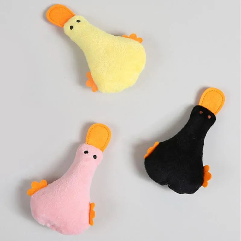 Yellow duck plush pet toy with catnip filling, squeaker sound, and rattle paper for dogs and cats