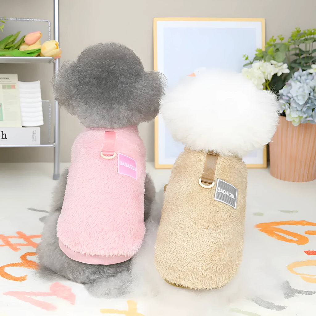 Blue coral fleece jacket for a dog, showing front leg openings and fluffy texture.