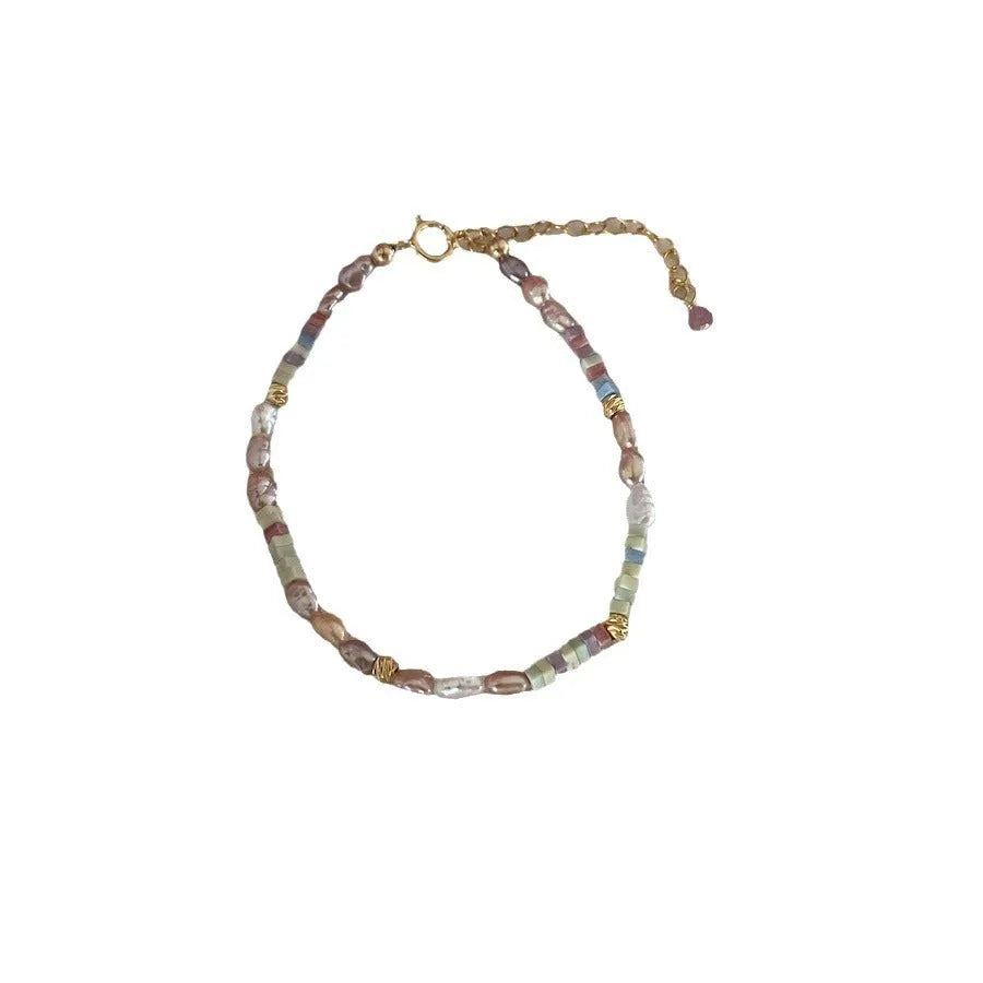 Women's purple pearl bracelet and necklace set with 14K gilded silver settings