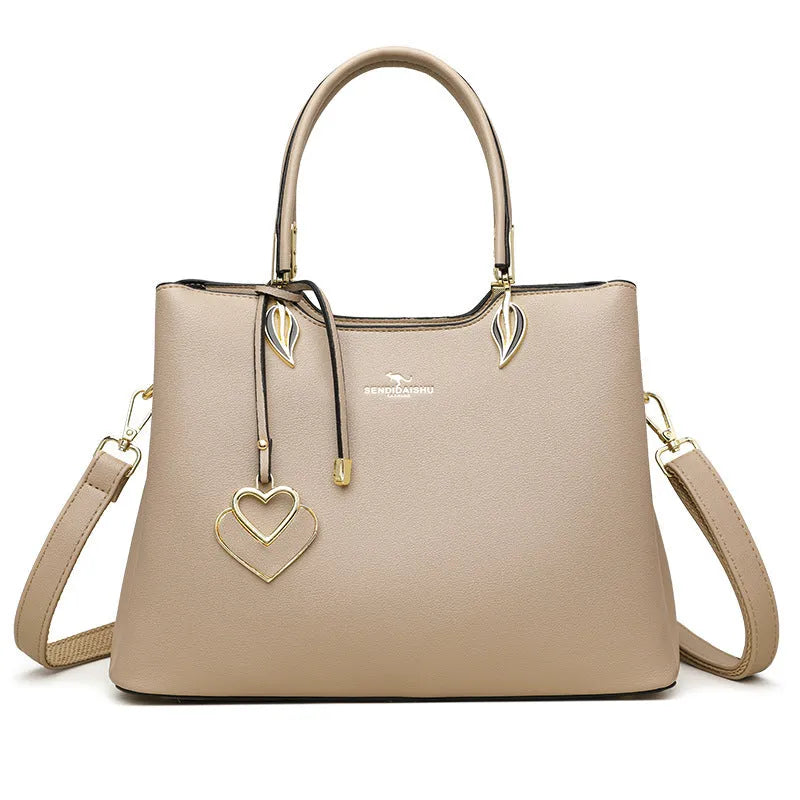 Women's PU leather messenger bag in multiple colours with cross-body strap and stitching detail