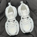 Beige mesh platform sports shoes with a wedge heel and front lace-up design
