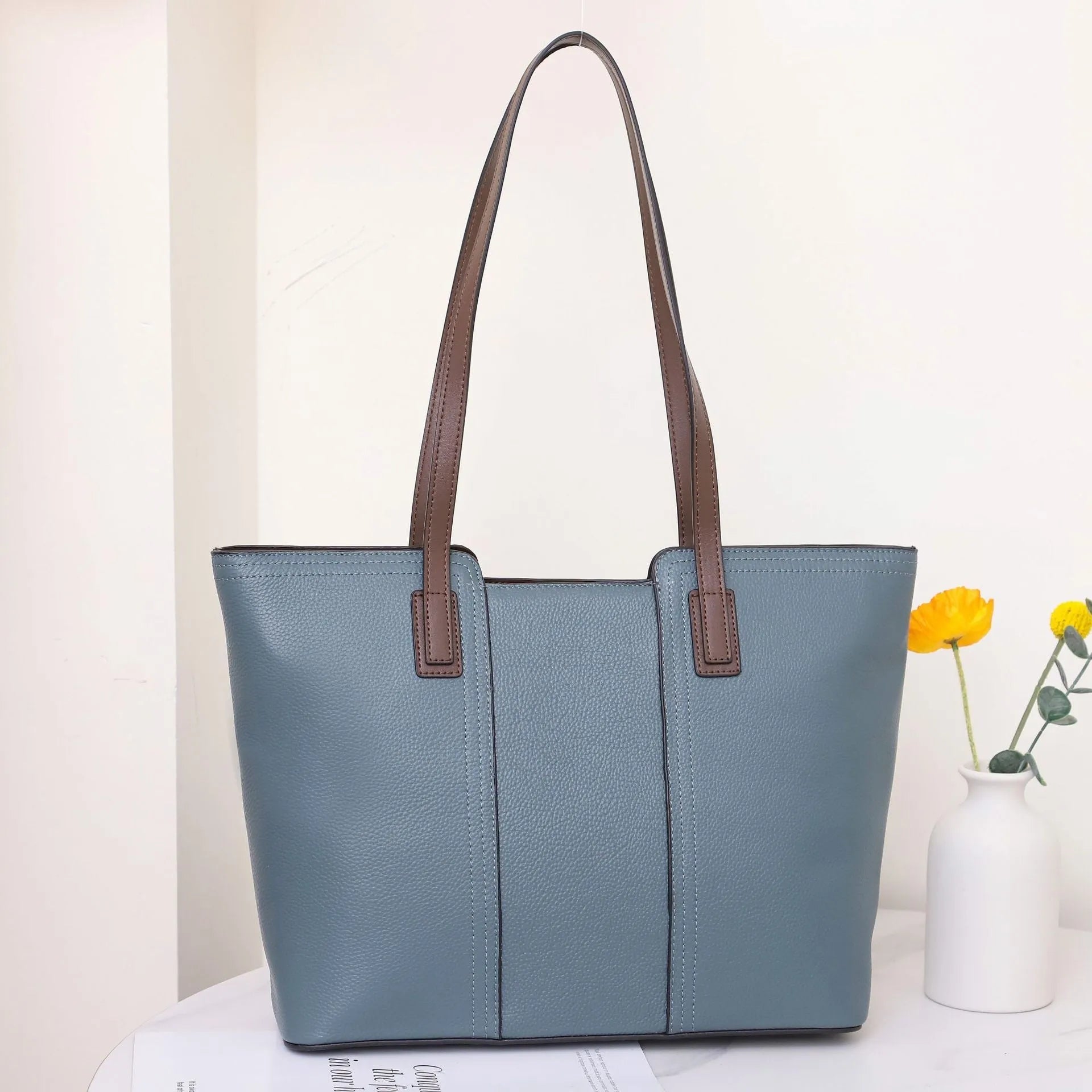 Women's genuine leather shoulder bag in box-type design with mobile phone compartment, shown in multiple colour options