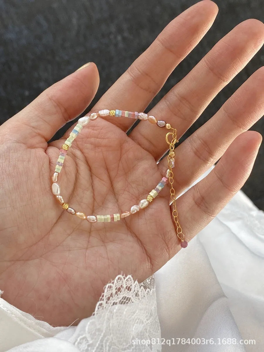 Women's purple pearl bracelet and necklace set with 14K gilded silver settings