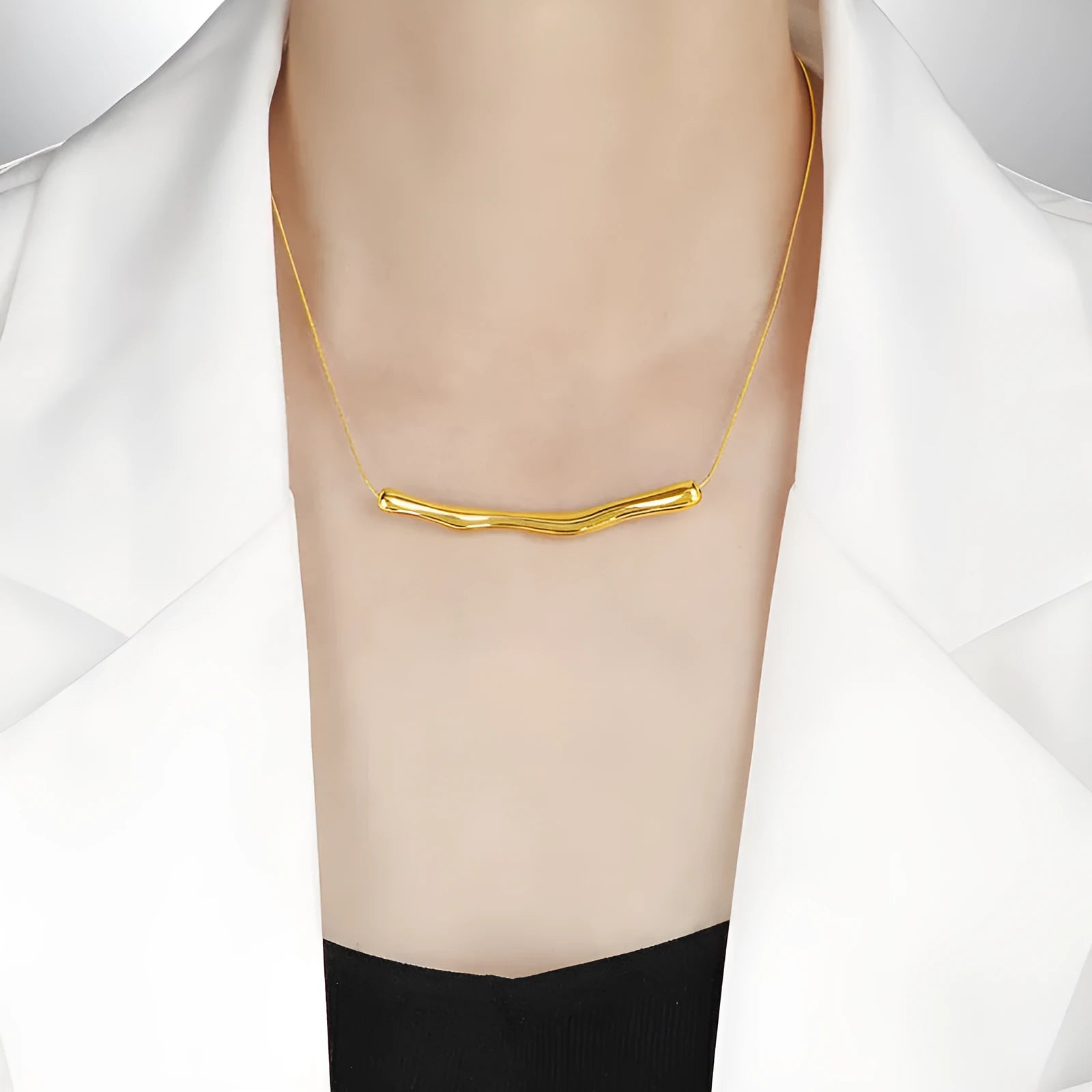 Gold and steel coloured irregular pleated titanium steel necklace for women.