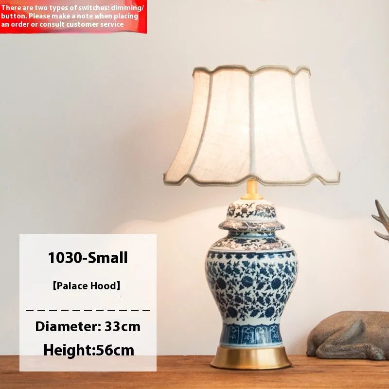 Chinese blue and white porcelain table lamp with copper base and cloth shade