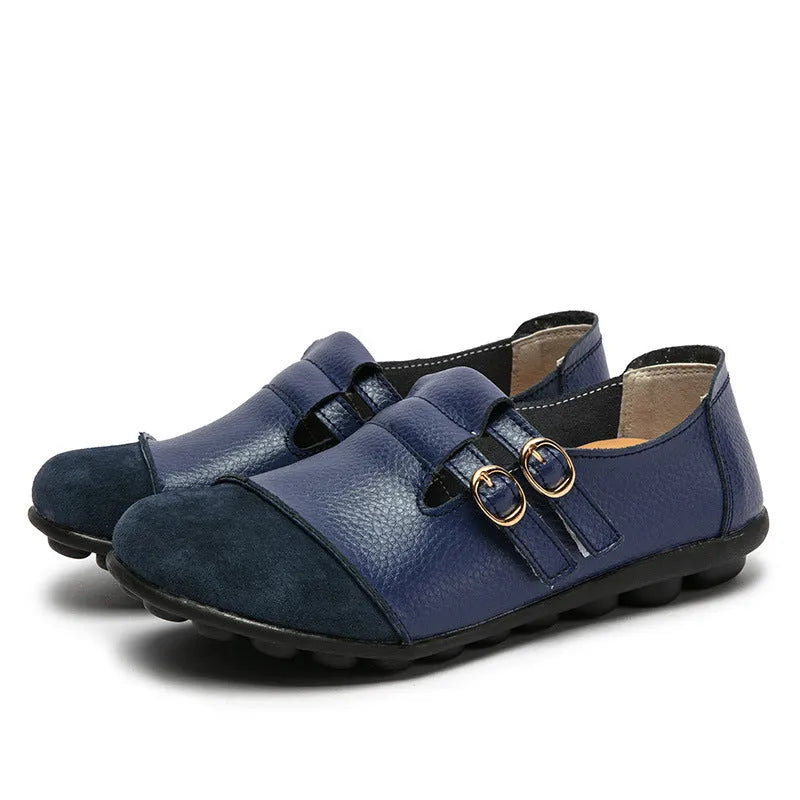 Women's casual round-toe flat shoes with a black Velcro strap on a cow leather upper.