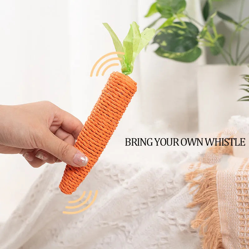 Assortment of cat toys including paper carrot bites, ringing stones, interactive sticks, and dental grinding sticks