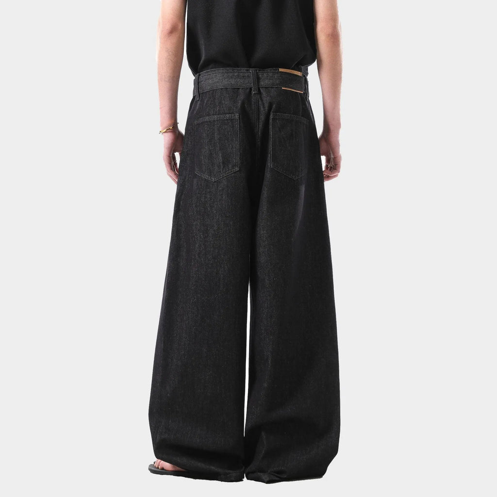 Women's black gold high waist straight leg denim jeans on a hanger.
