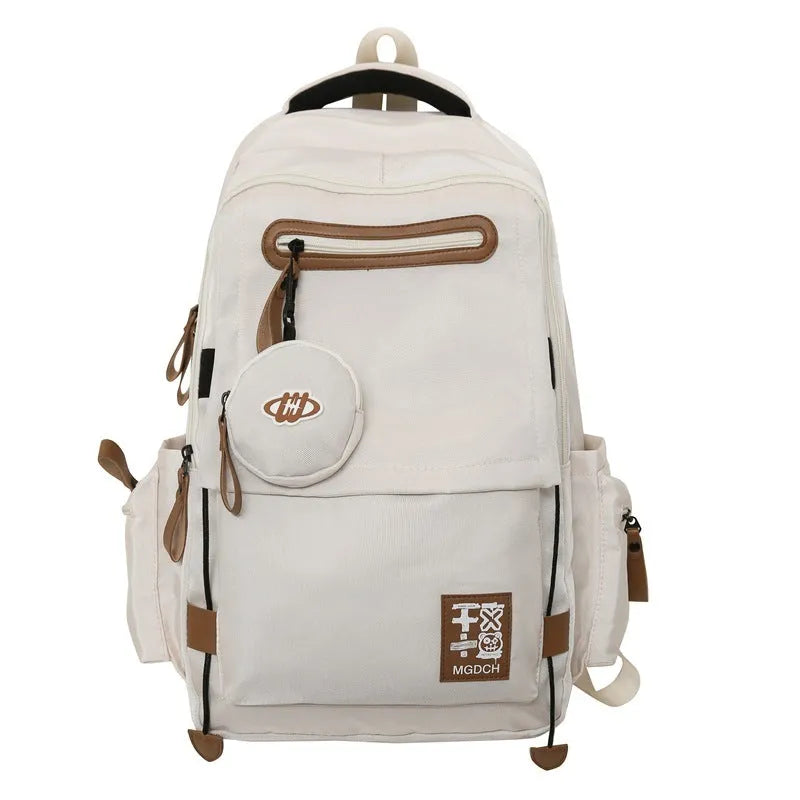 Large black nylon school backpack with curved shoulder straps for secondary school students.