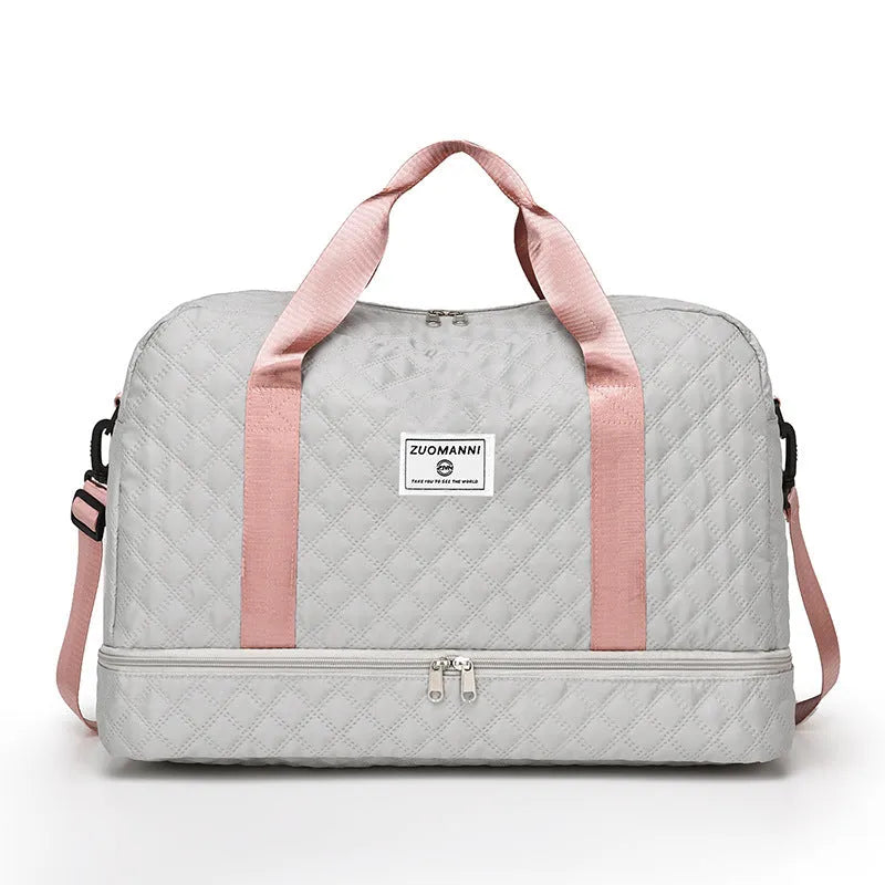 Oxford cloth travel bag with 36-55 litre capacity for leisure trips and buggy use in solid colour options
