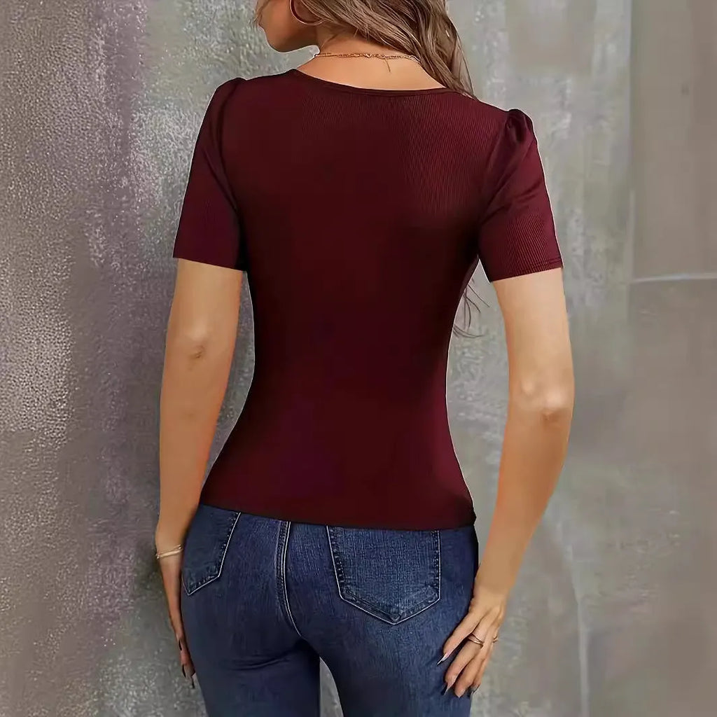 Women's slim fit knitted short sleeve pullover in polyester with low neckline