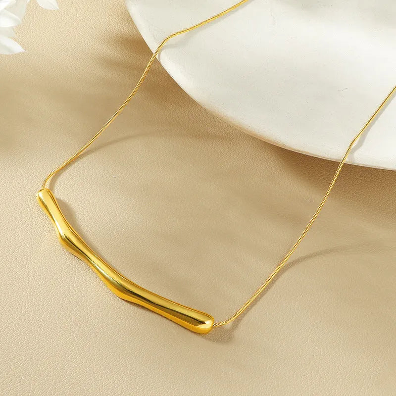 Gold and steel coloured irregular pleated titanium steel necklace for women.