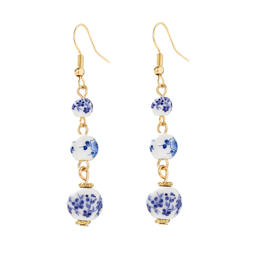 Long blue and white porcelain ceramic bead earrings with alloy frame in a retro Chinese style.