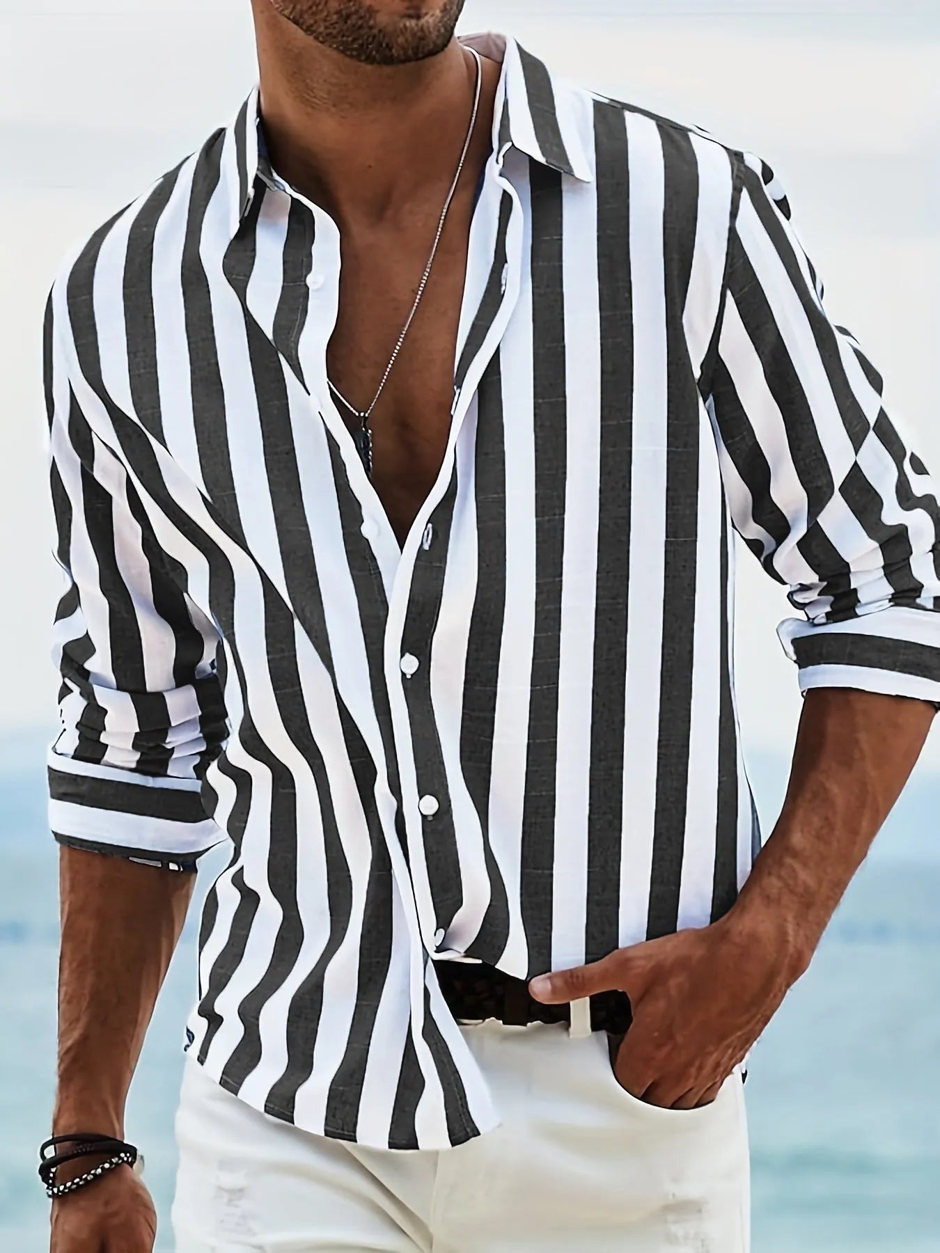 Men's loose striped long-sleeved cardigan shirt in British style on a hanger